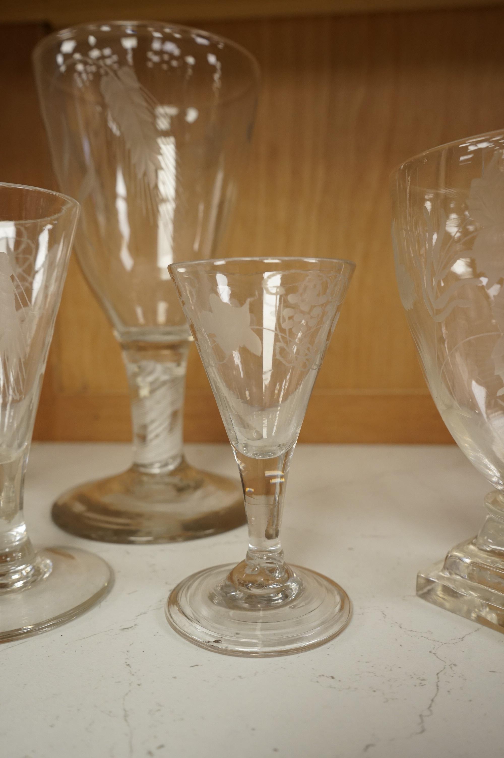 A group of 18th/early 19th century ale glasses, including two rummers, a large DSOT stem glass and two smaller funnel shaped glasses, largest 21cm high (5)